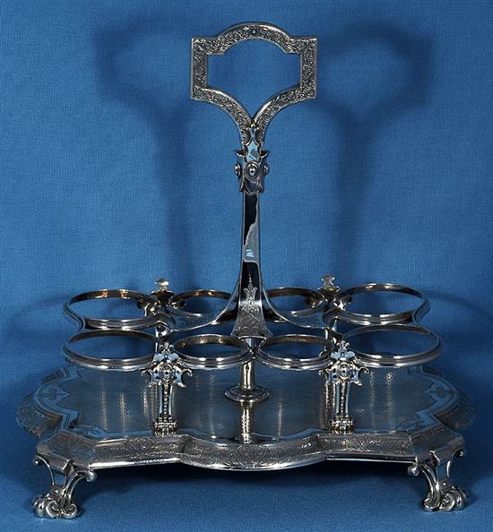 A Victorian silver eight bottle cruet stand and eight original bottles, by Walter & John Barnard, height 280mm, weight 40oz